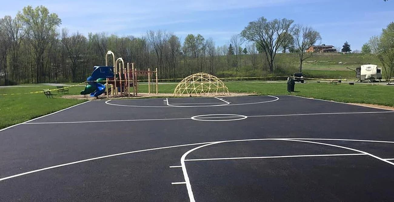 School athletic court concrete construction in Allen, TX
